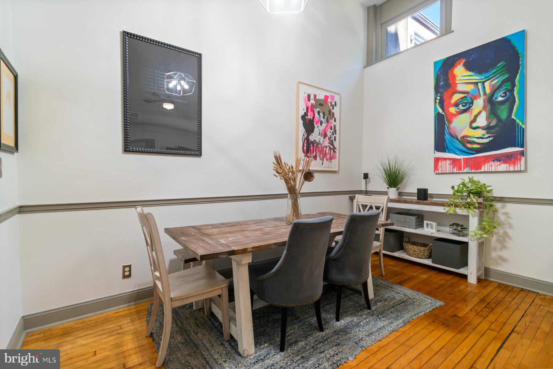 511 South Bond Street, Unit 206 Baltimore, MD 21231 - Photo 11 of 27 a view of a dining room with furniture and wooden floor