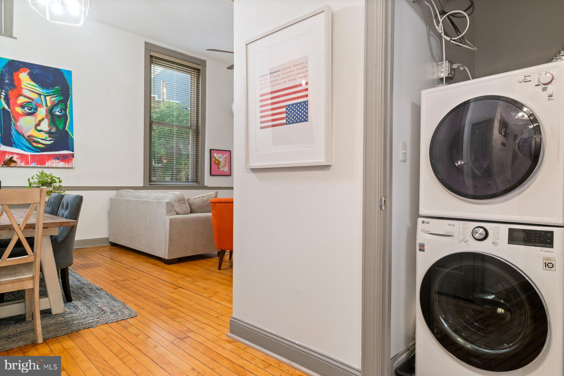 511 South Bond Street, Unit 206 Baltimore, MD 21231 - Photo 14 of 27 a view of a bedroom with washer and dryer
