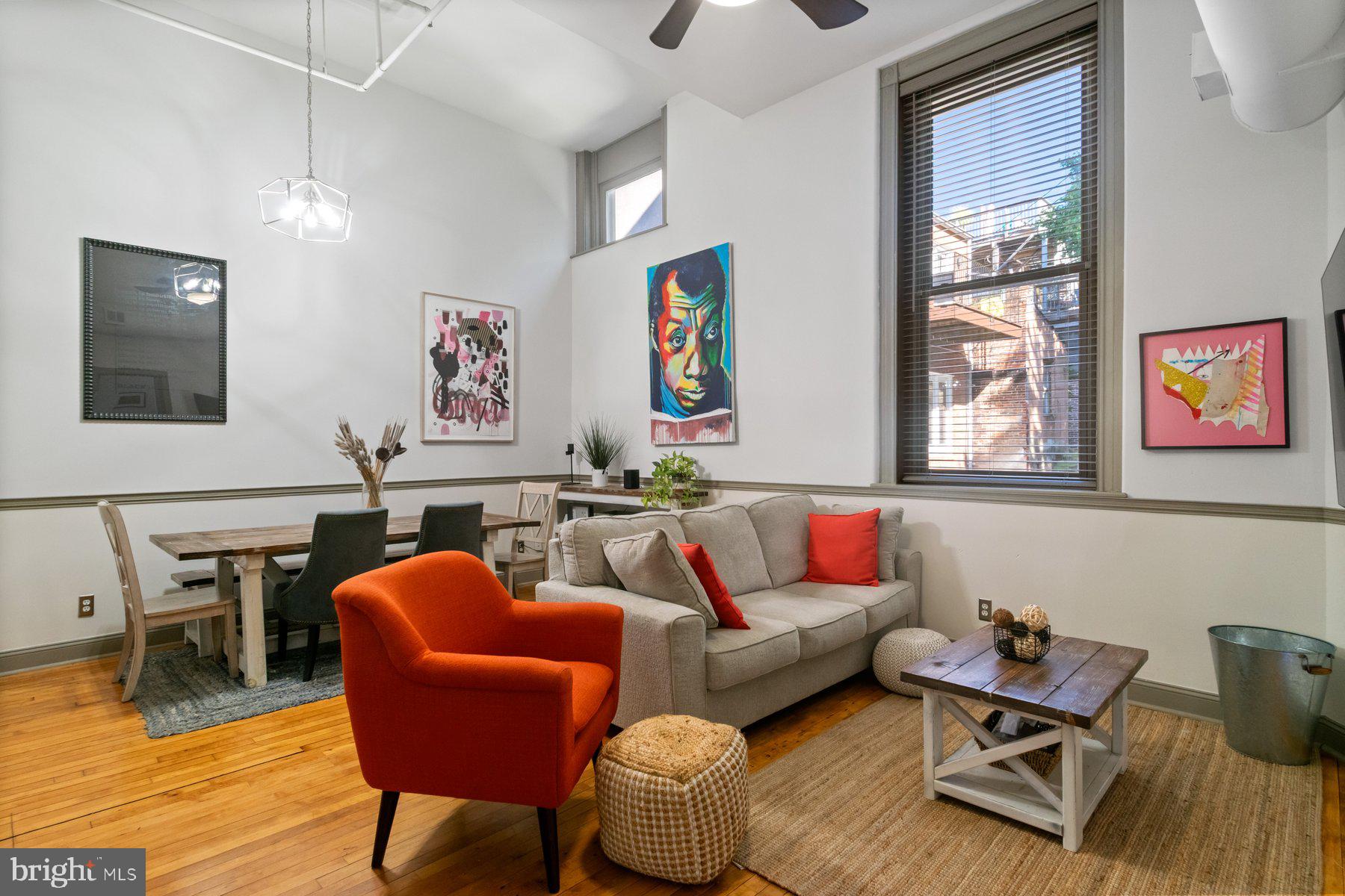 511 South Bond Street, Unit 206 Baltimore, MD 21231 - Photo 2 of 27 a living room with furniture and a wooden floor