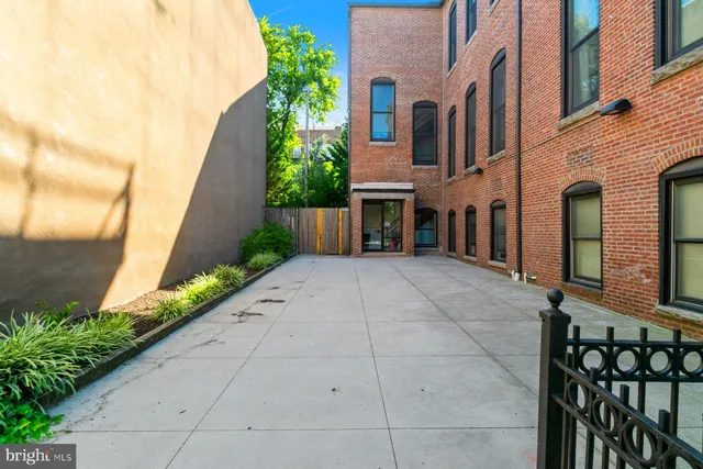 a building exterior with furniture