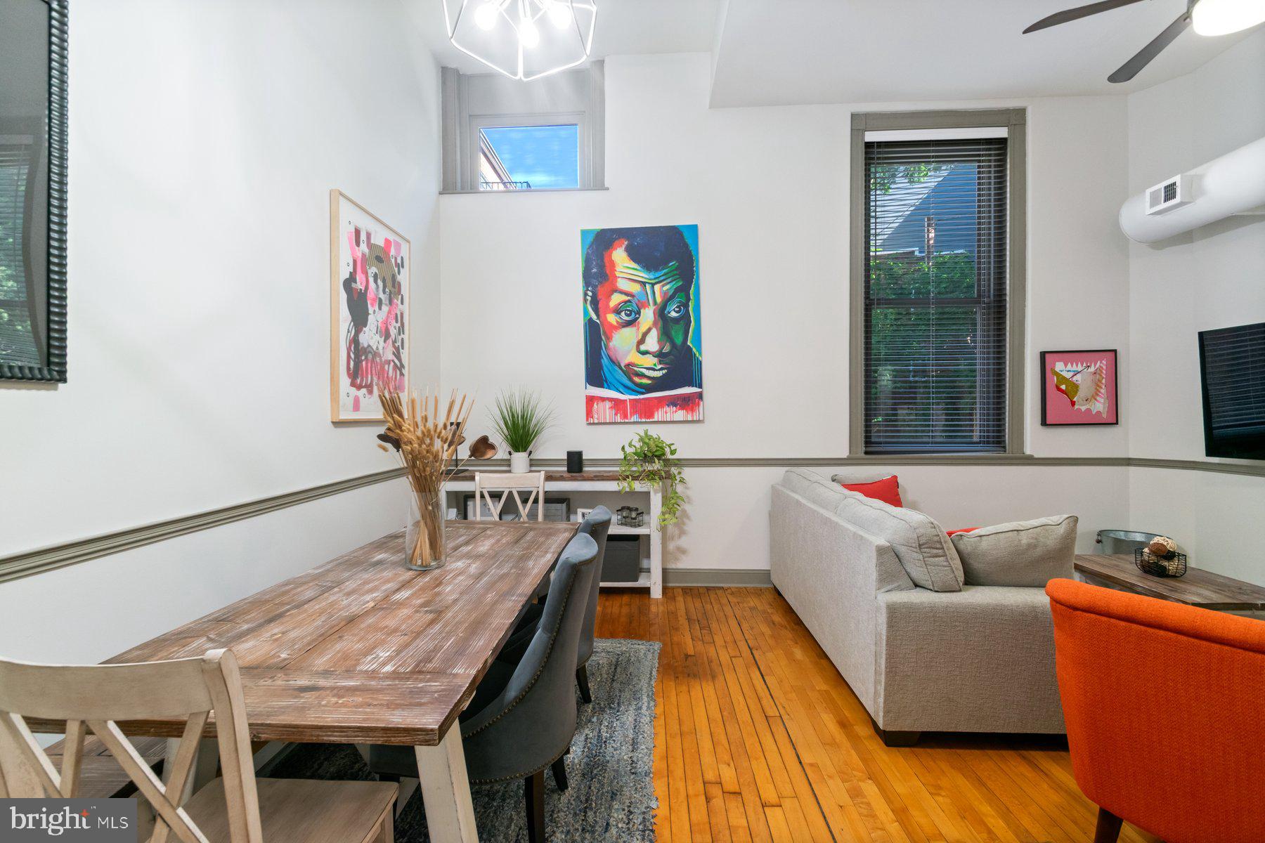 511 South Bond Street, Unit 206 Baltimore, MD 21231 - Photo 6 of 27 a living room with furniture and wooden floor