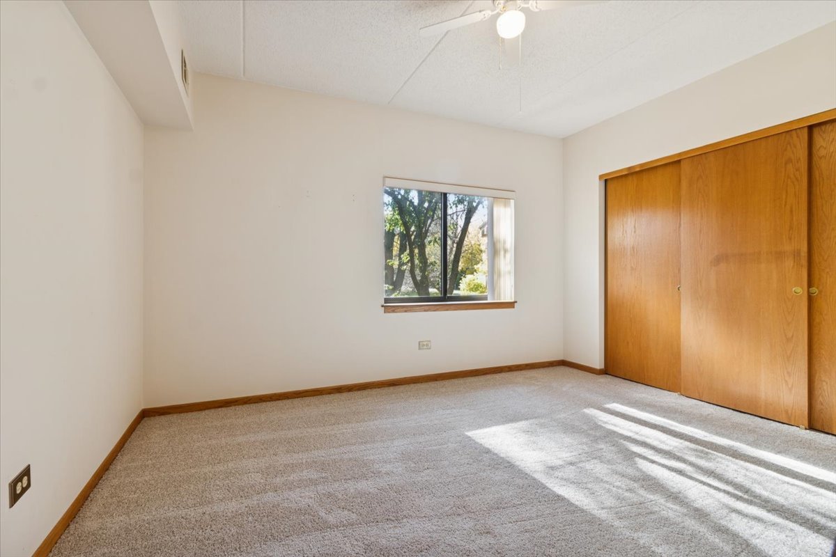 3119 Ingalls Avenue, Unit 2A Joliet, IL 60435 - Photo 15 of 20 an empty room with windows
