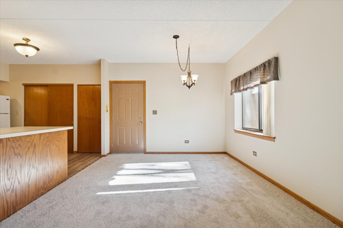 3119 Ingalls Avenue, Unit 2A Joliet, IL 60435 - Photo 7 of 20 a view of an empty room with a window