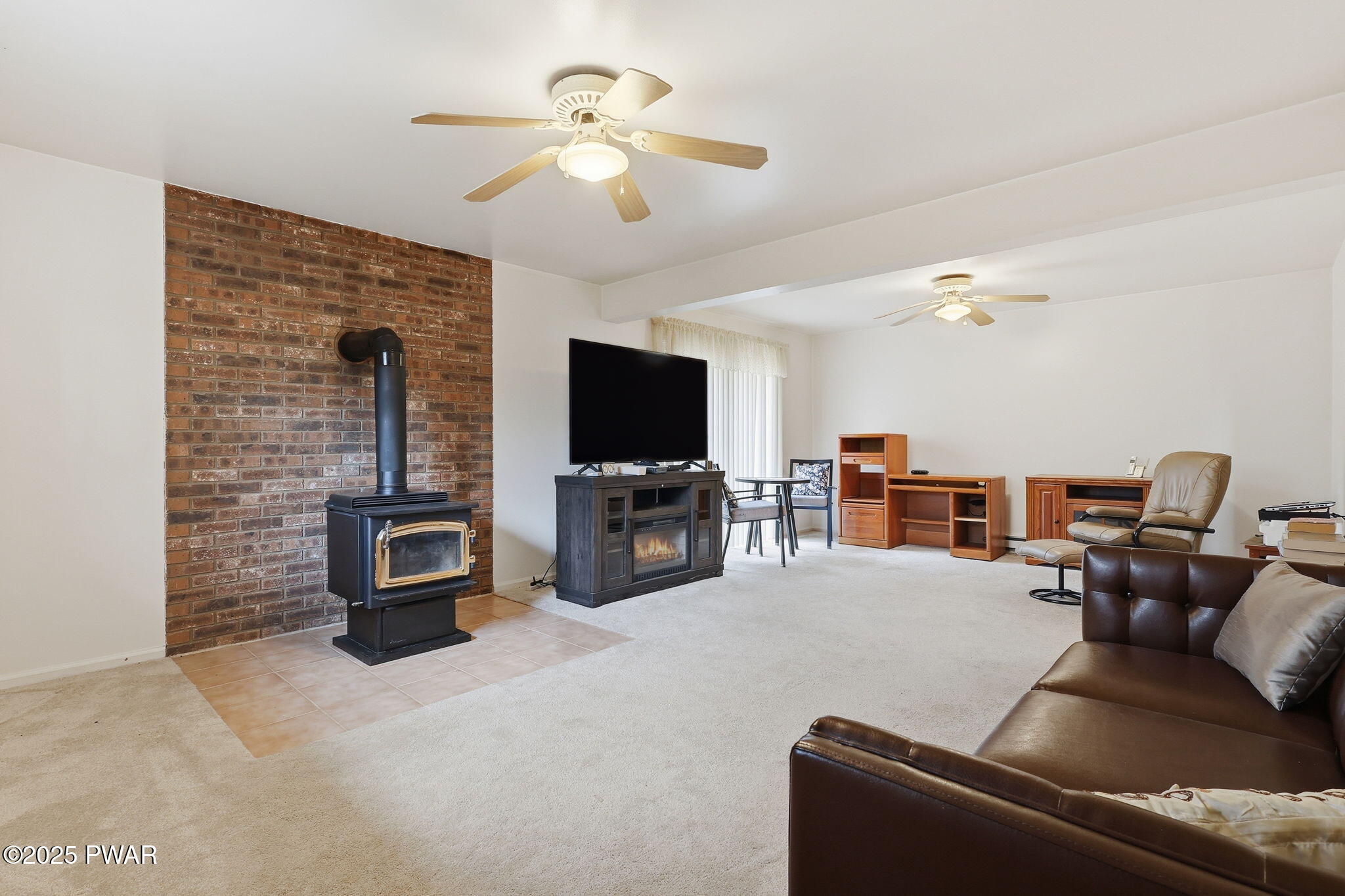 901 Goose Pond Road Lake Ariel, PA 18436 - Photo 25 of 54 LL family room with wood stove