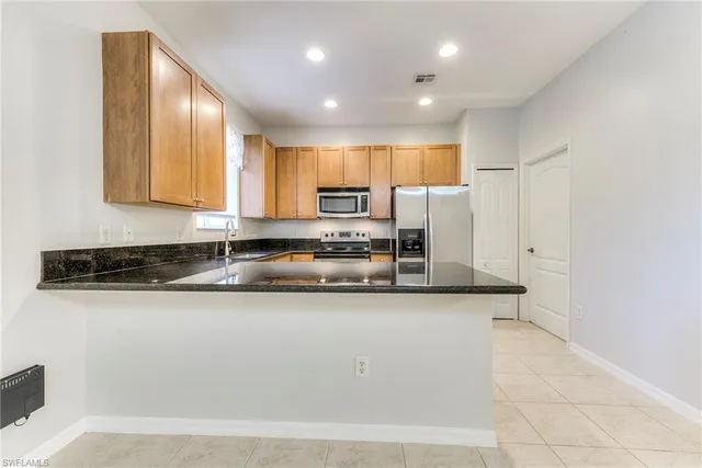 $319,900 | 10241 Olivewood Way, Unit 150, Estero, FL 33928