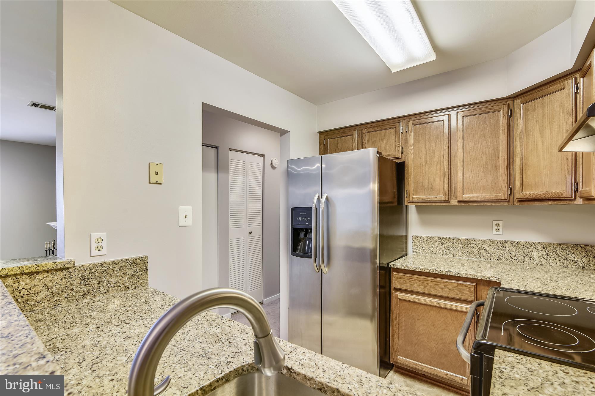 7707 Lexton Place, Unit 41 Springfield, VA 22152 - Photo 14 of 56 KITCHEN OPEN TO REST OF HOME