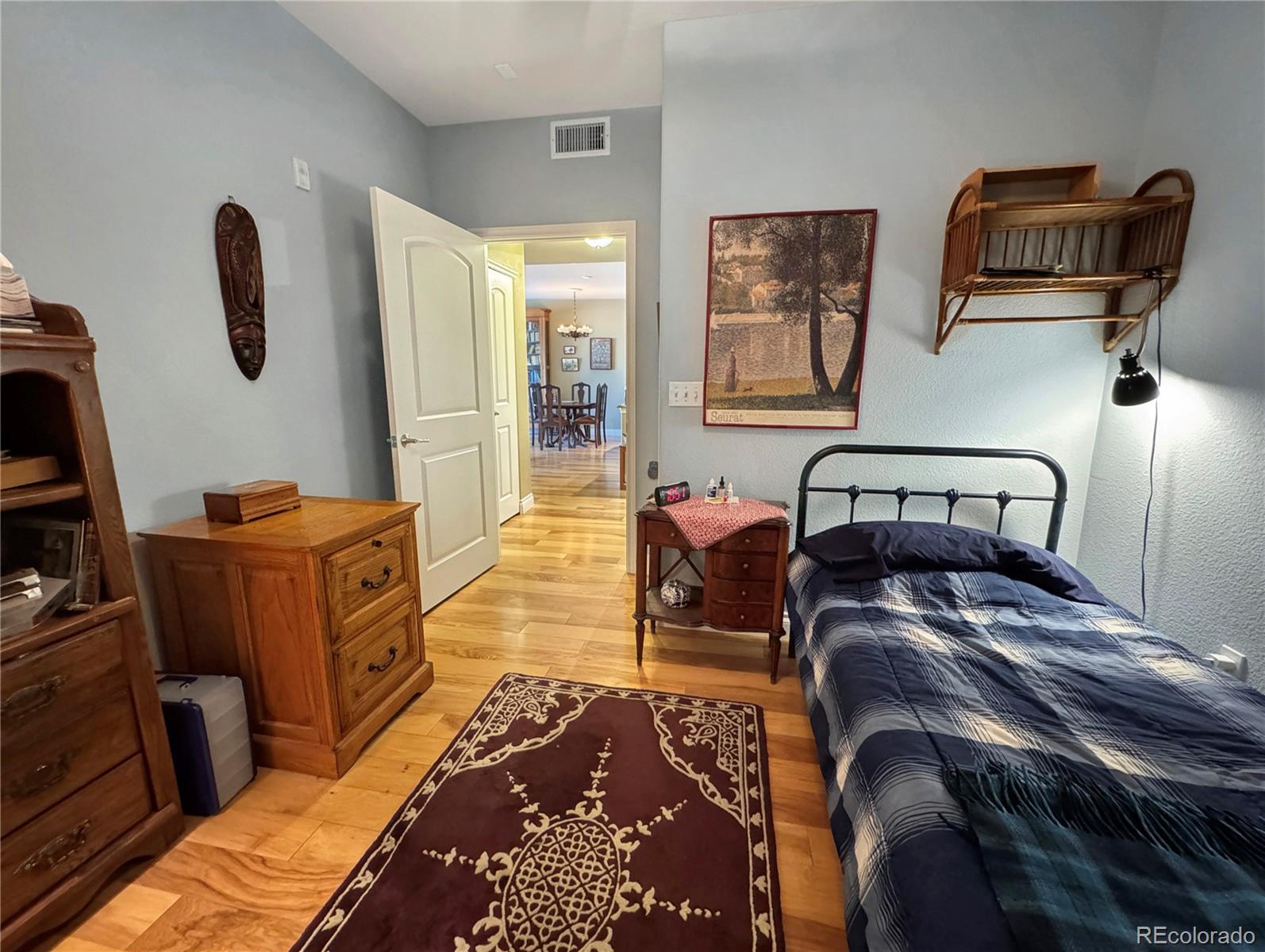 620 11th Street, Unit 306 Golden, CO 80401 - Photo 11 of 22 a bedroom with furniture and a couch