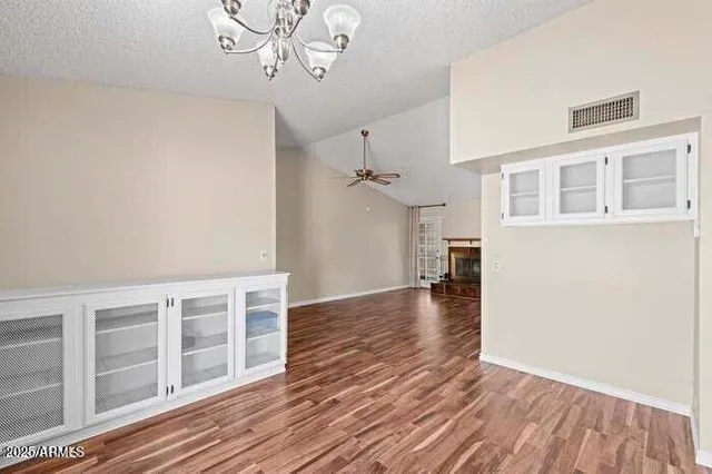 a view of a livingroom with wooden floor