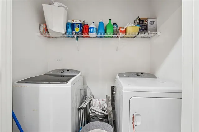 a utility room with dryer and washer