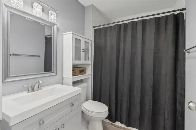 a bathroom with a sink and a toilet