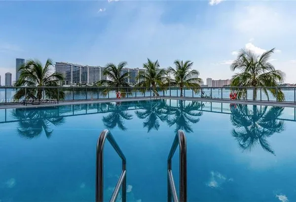 a view of a balcony with plants