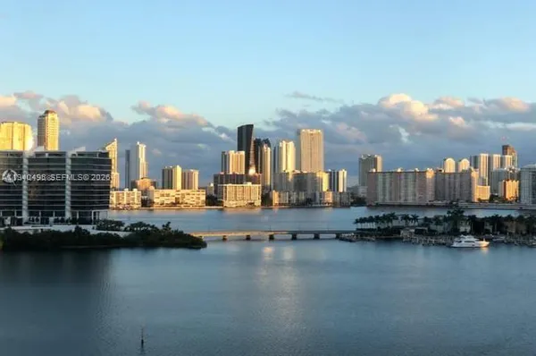 a view of a living room and a balcony