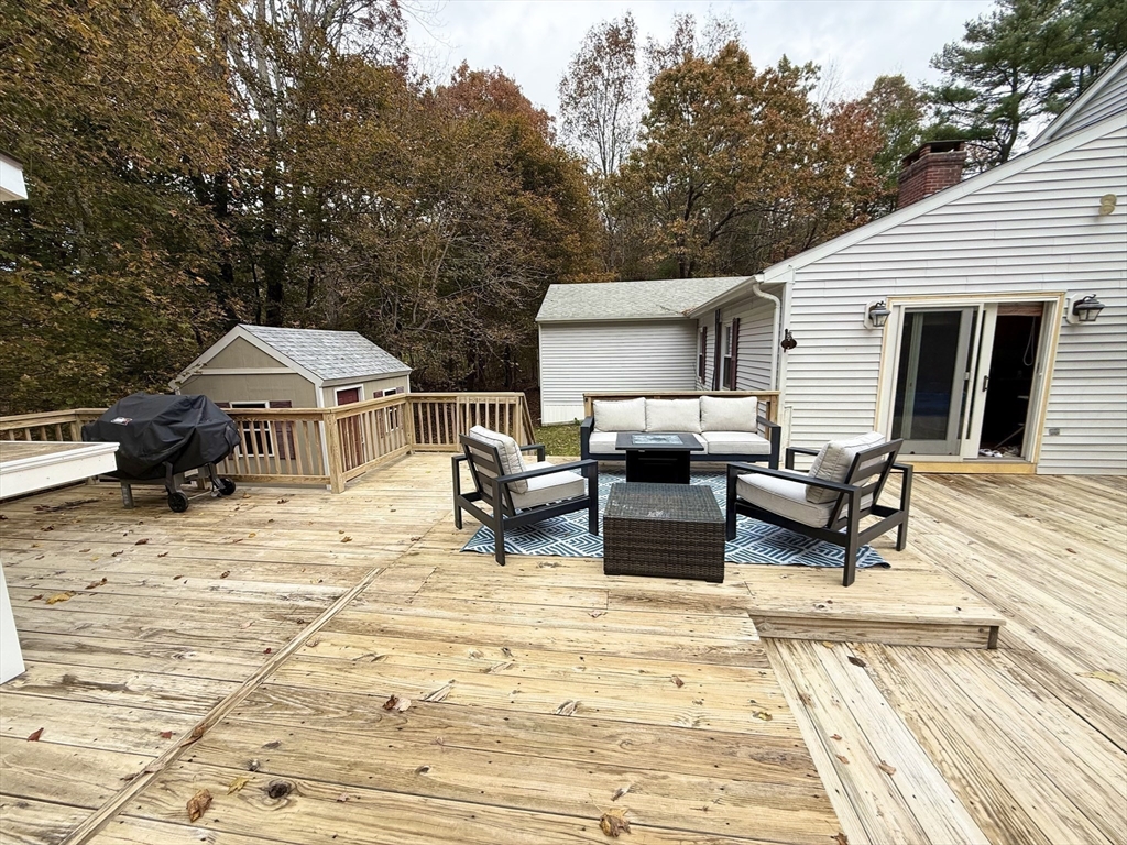7 Orchard Road Sturbridge, MA 01566 - Photo 6 of 40 a outdoor space with patio lots of furniture and mountain view