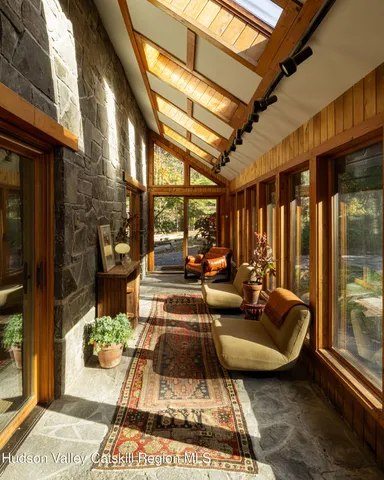 a view of swimming pool with outdoor seating