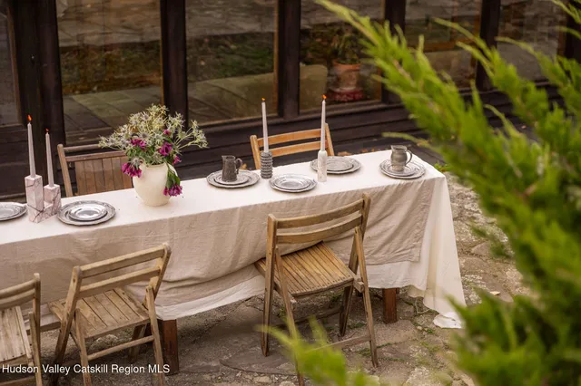 a outdoor view of a building with sitting area