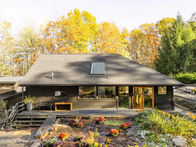 a view of swimming pool with outdoor seating