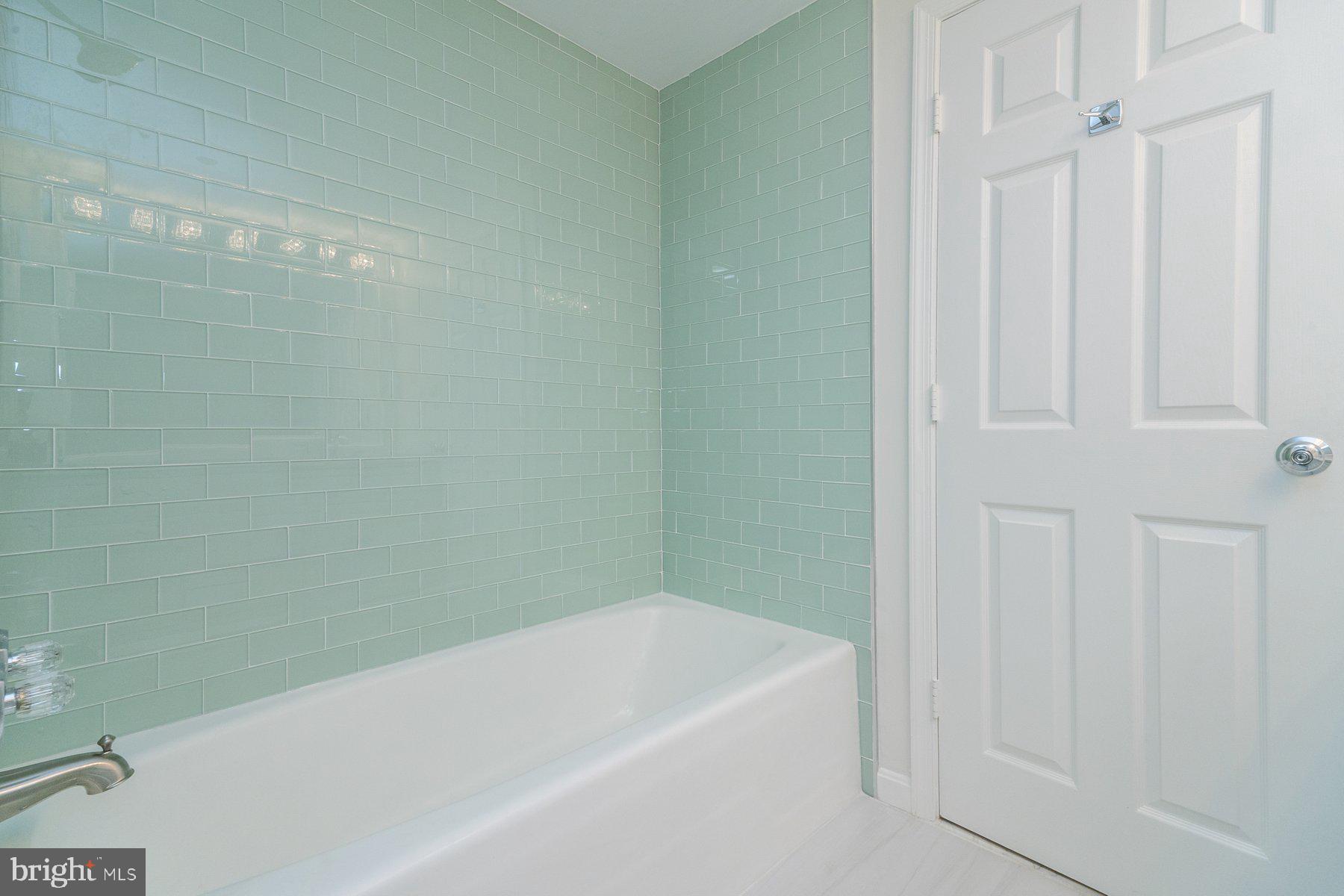 2331 Old Court Road, Unit 201 Baltimore, MD 21208 - Photo 19 of 38 a bathroom with a bathtub