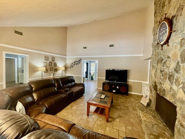 4537 Sears Road Columbus, GA 31907 - Photo 15 of 41 a living room with furniture a rug and a fireplace