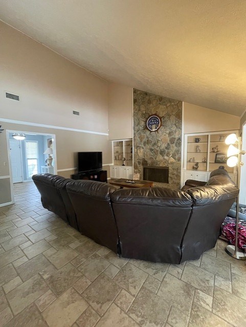 4537 Sears Road Columbus, GA 31907 - Photo 16 of 41 a living room with furniture and a fireplace