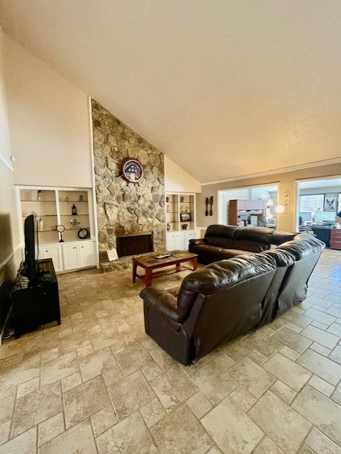 4537 Sears Road Columbus, GA 31907 - Photo 18 of 41 a living room with furniture a fireplace and a flat screen tv