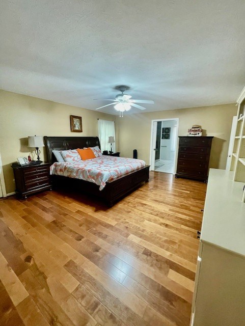 4537 Sears Road Columbus, GA 31907 - Photo 20 of 41 a bedroom with a bed and wooden floor