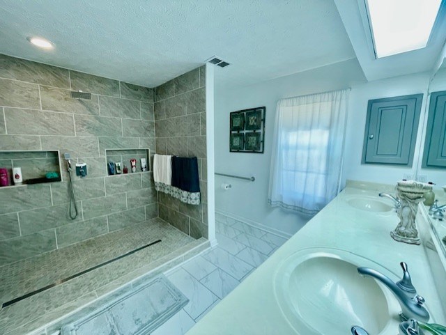 4537 Sears Road Columbus, GA 31907 - Photo 22 of 41 a bathroom with a sink and a mirror