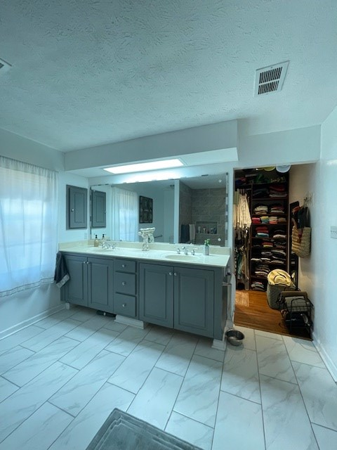 4537 Sears Road Columbus, GA 31907 - Photo 24 of 41 a kitchen with a sink and cabinets