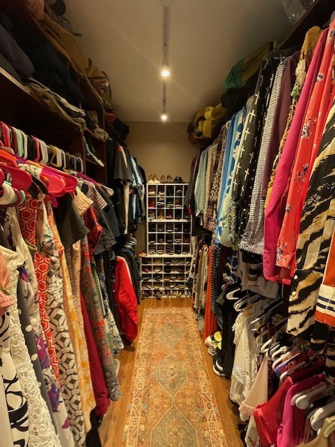 4537 Sears Road Columbus, GA 31907 - Photo 25 of 41 a view of walk in closet with clothes