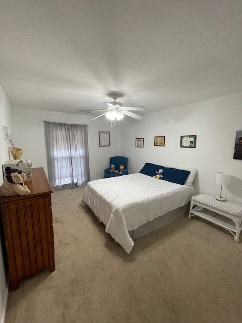 4537 Sears Road Columbus, GA 31907 - Photo 26 of 41 a spacious bedroom with a bed and dresser