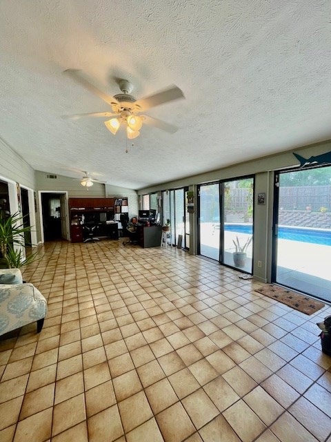 4537 Sears Road Columbus, GA 31907 - Photo 33 of 41 a view of a livingroom with a dinning area hardwood and a kitchen view