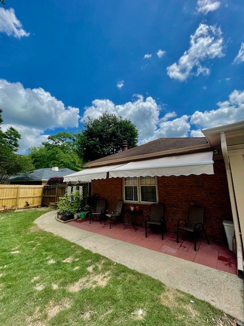 4537 Sears Road Columbus, GA 31907 - Photo 36 of 41 a view of a house with a yard porch and sitting area