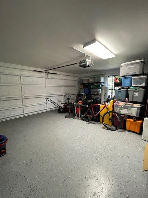 4537 Sears Road Columbus, GA 31907 - Photo 38 of 41 a view of a garage with parked cars