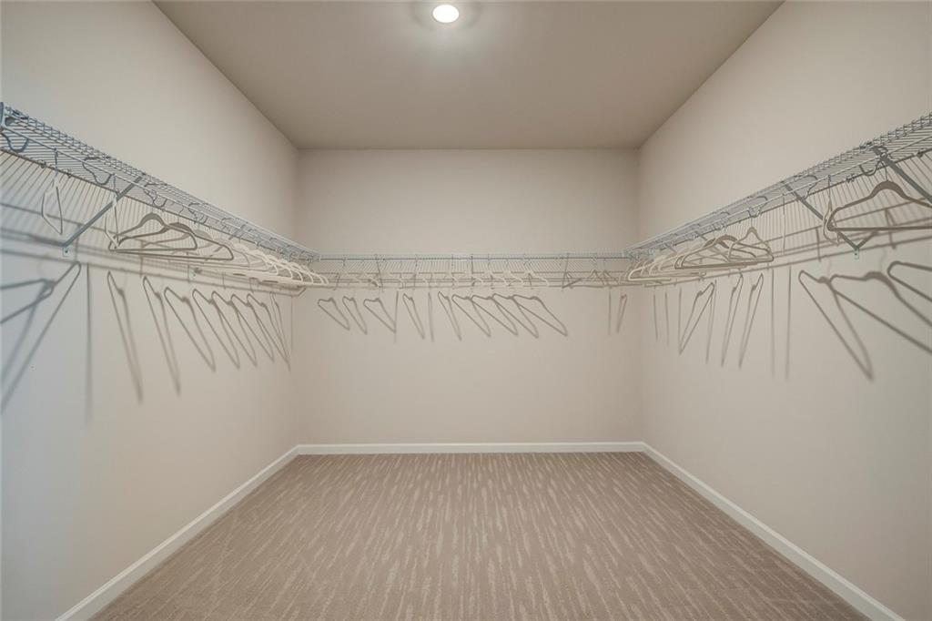 15 Cardinal Rdg Court Winder, GA 30680 - Photo 29 of 86 a view of a room with racks on the wall