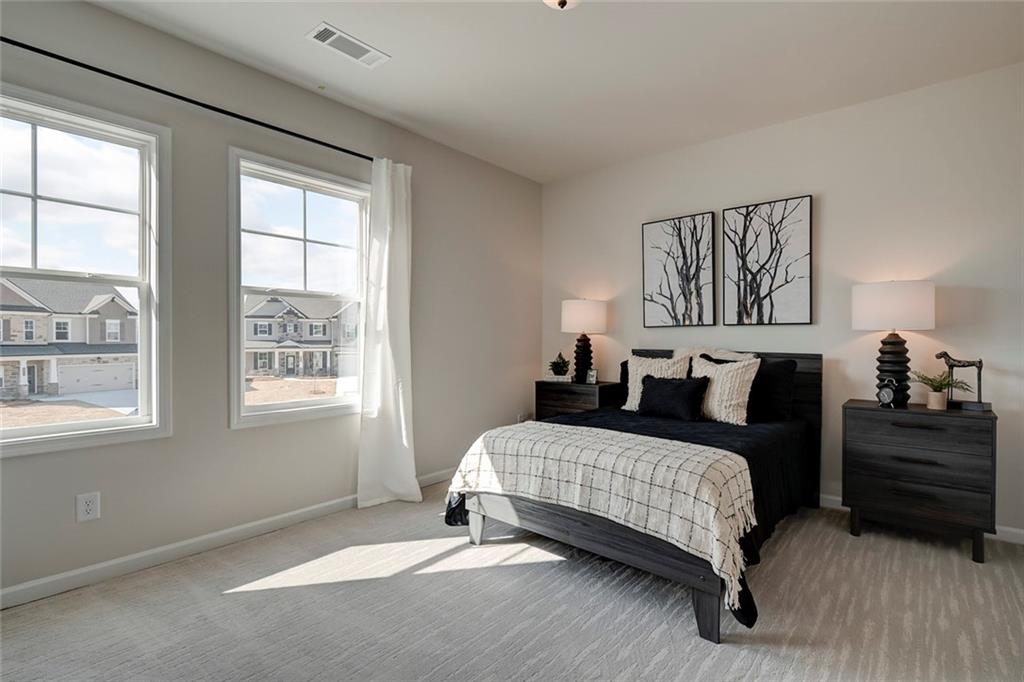 15 Cardinal Rdg Court Winder, GA 30680 - Photo 6 of 86 a bedroom with a bed and a window