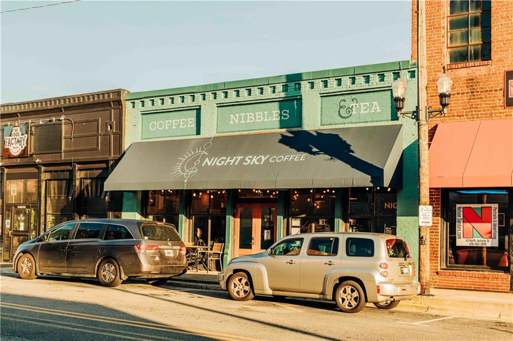 15 Cardinal Rdg Court Winder, GA 30680 - Photo 64 of 86 a car parked in front of a building