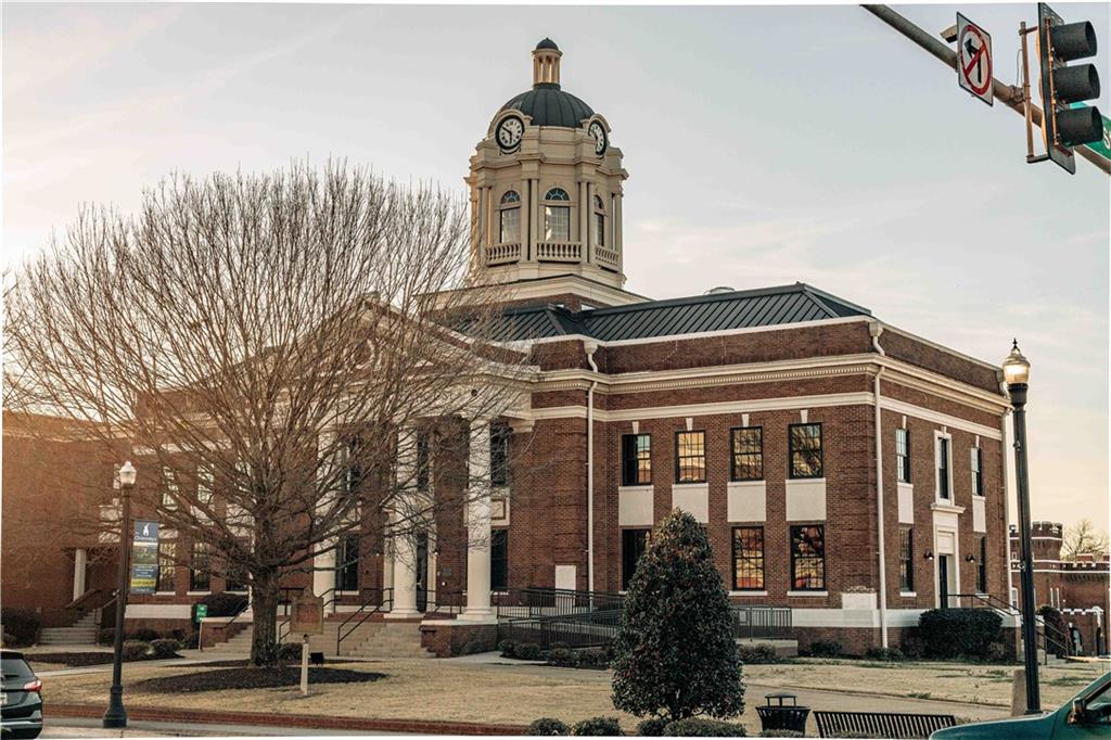 15 Cardinal Rdg Court Winder, GA 30680 - Photo 74 of 86 a front view of a building with a street