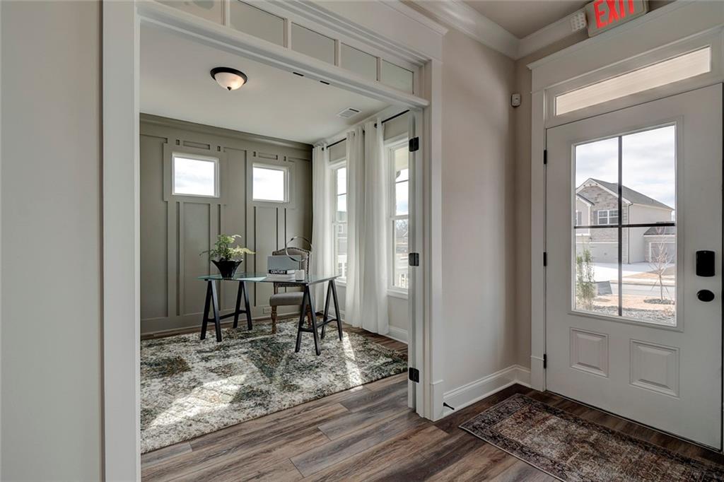 15 Cardinal Rdg Court Winder, GA 30680 - Photo 10 of 86 a view of dining room with wooden floor and a window