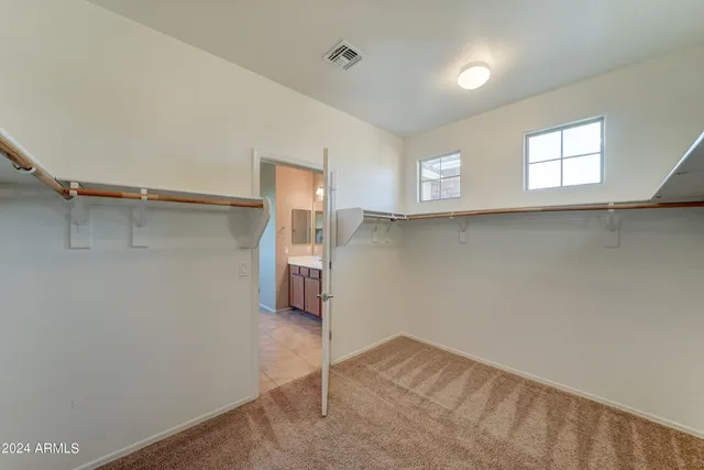 a view of a room with a rack on the wall