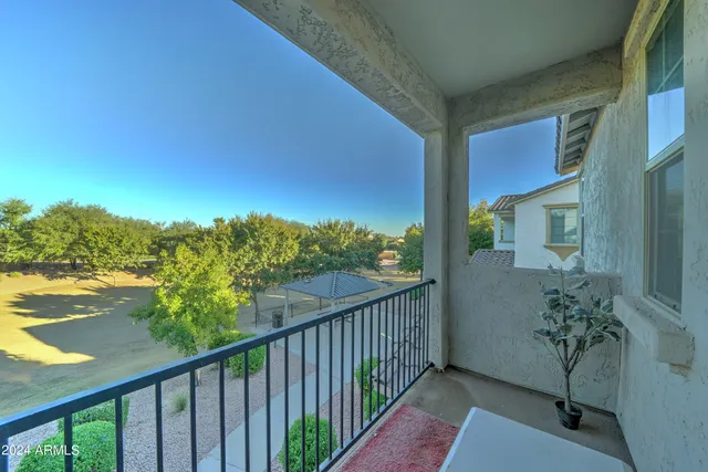a view of a balcony with lake view