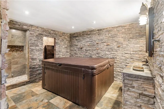 a bathroom with a sink and a shower