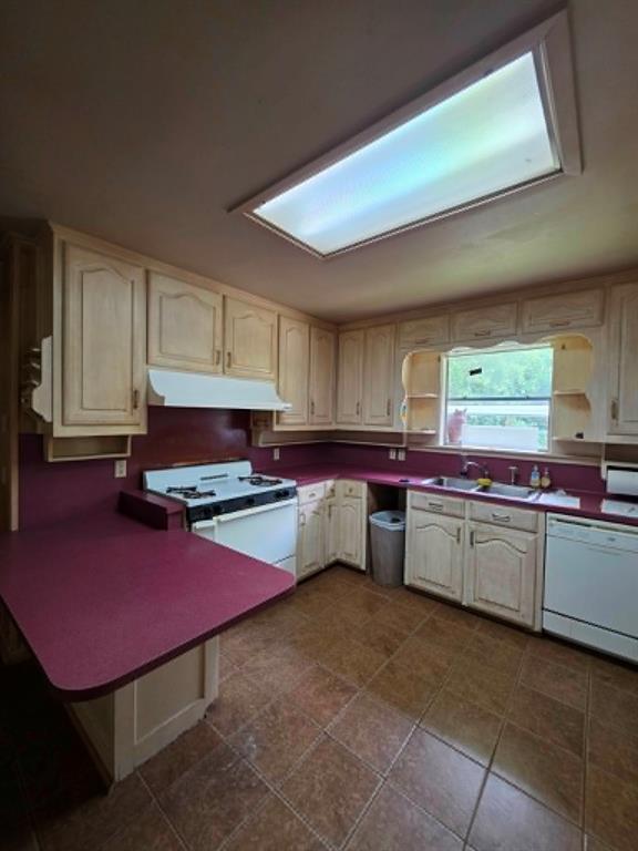 4514 West Loop 281 Longview, TX 75604 - Photo 20 of 36 Kitchen featuring light-toned cabinetry, maroon countertops, and a white range