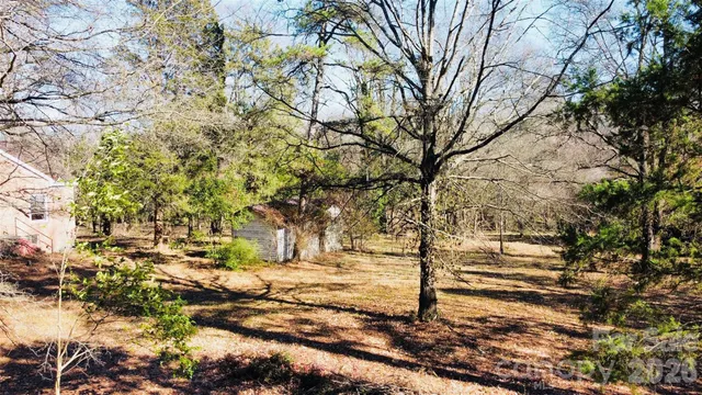 a view of yard covered with snow