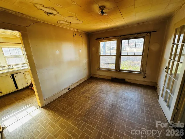 an empty room with windows