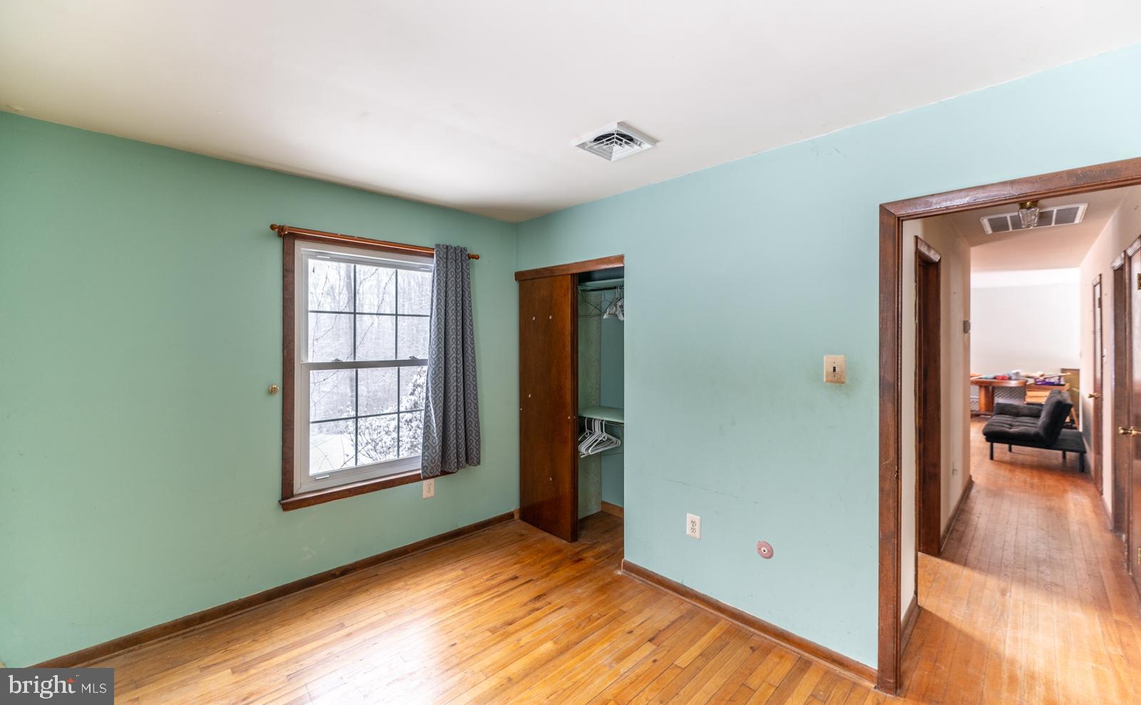 948 Quarry Road Gap, PA 17527 - Photo 18 of 34 wooden floor in an empty room with a window
