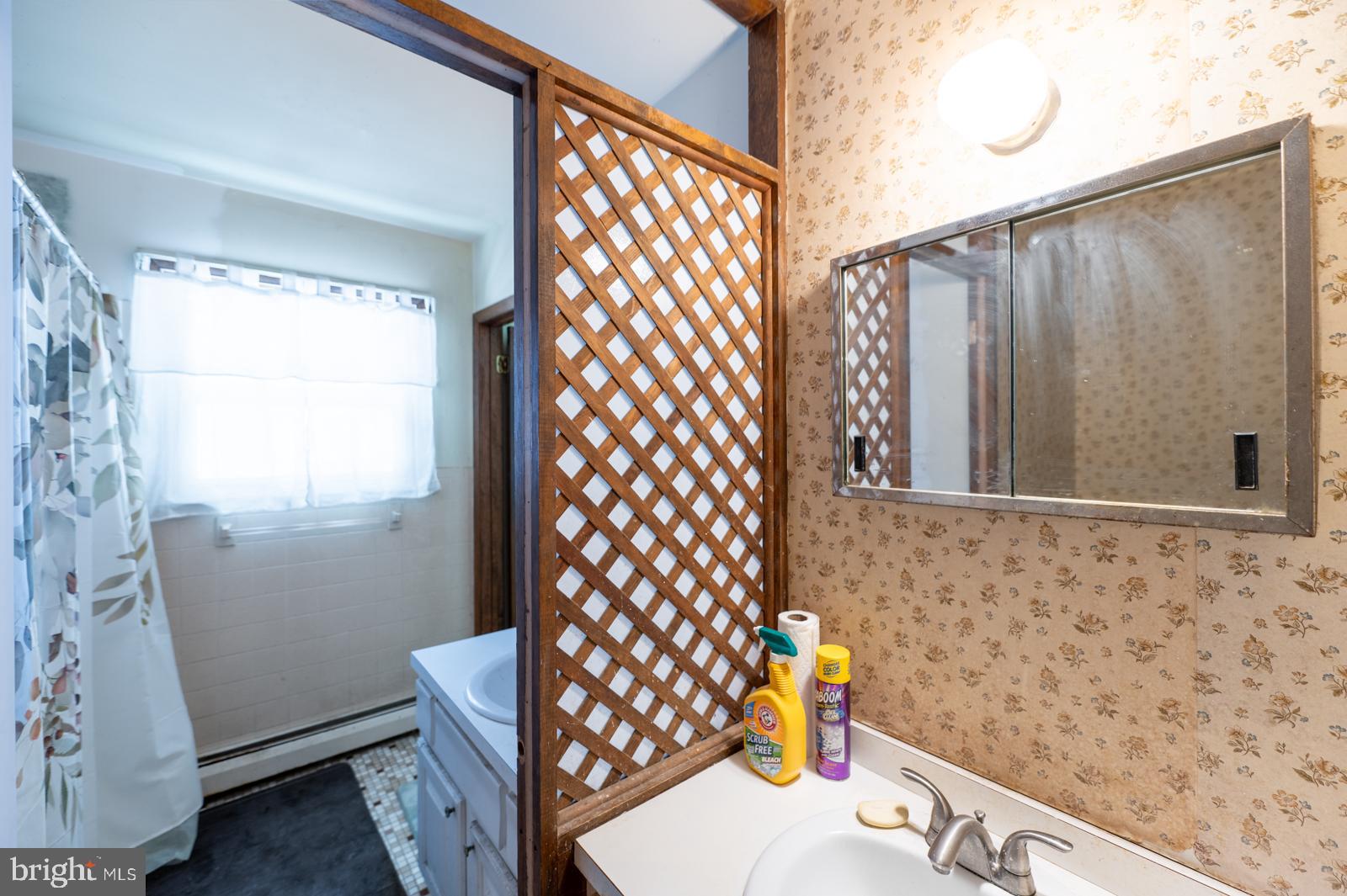 948 Quarry Road Gap, PA 17527 - Photo 22 of 34 a bathroom with a sink toilet and shower