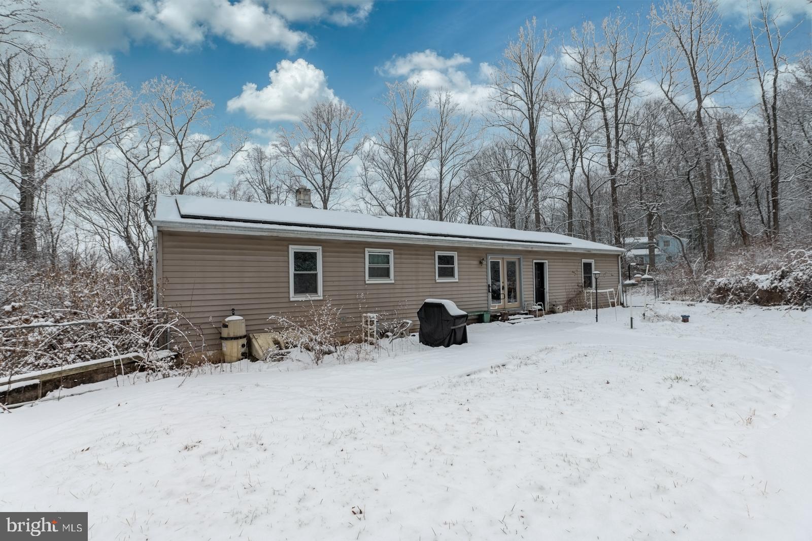 948 Quarry Road Gap, PA 17527 - Photo 33 of 34 a view of a house with a yard covered in snow