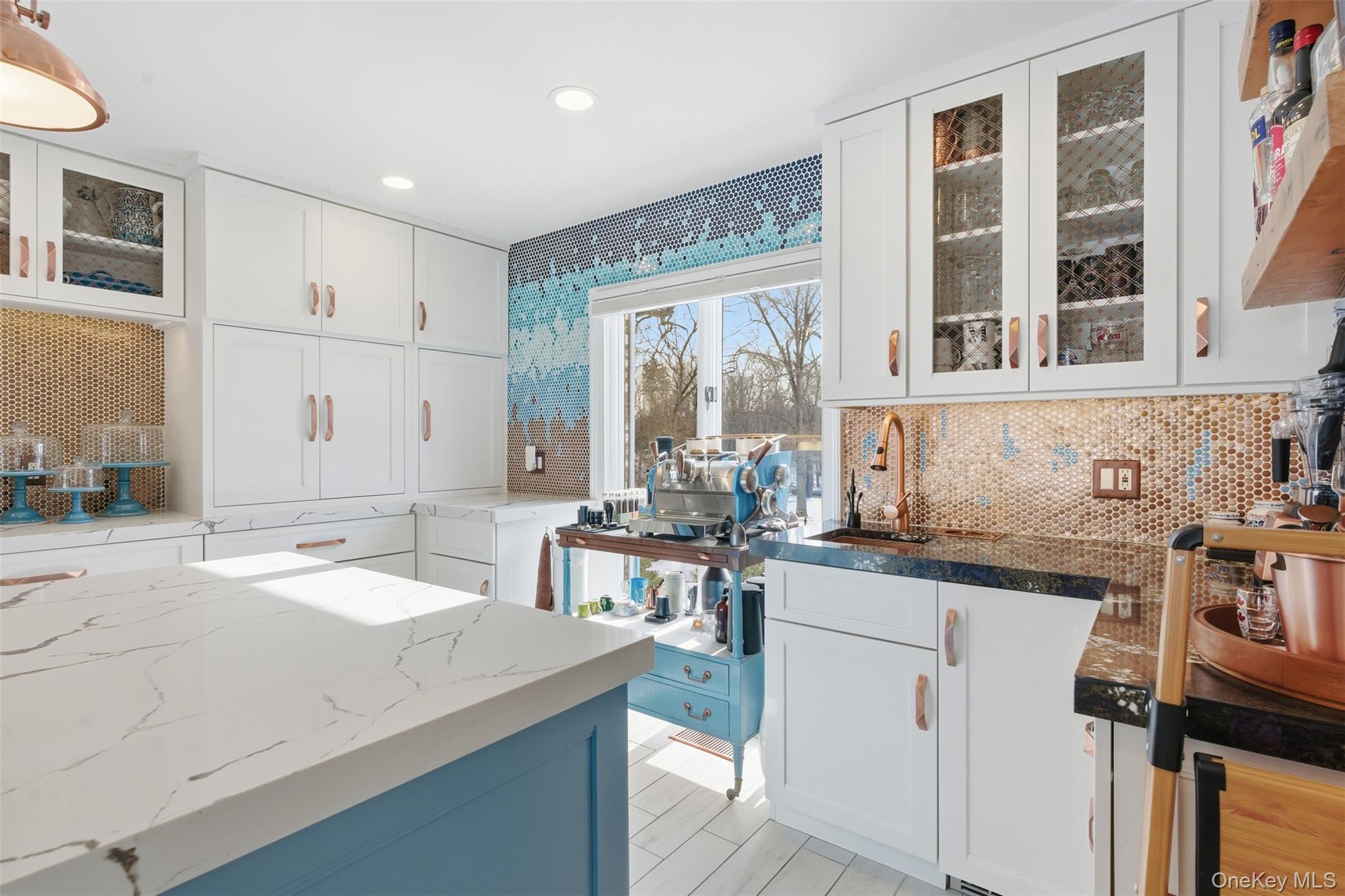 134 Fostertown Road Newburgh, NY 12550 - Photo 11 of 50 a kitchen with a sink stove and cabinets