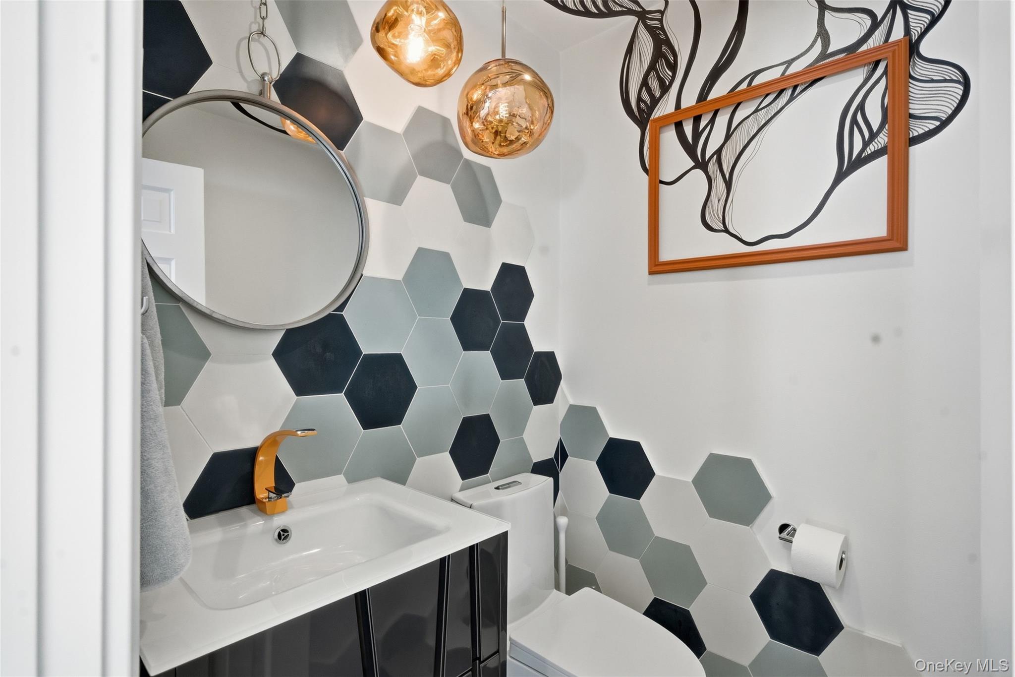 134 Fostertown Road Newburgh, NY 12550 - Photo 20 of 50 a bathroom with a sink and mirror with toilet