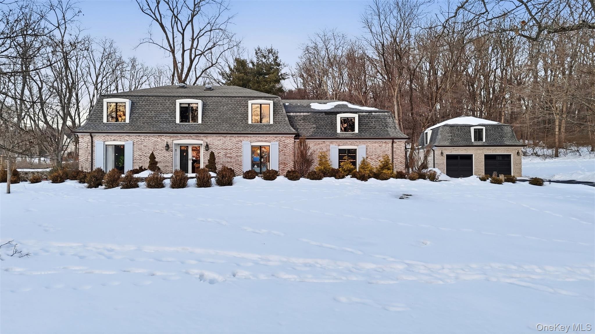 134 Fostertown Road Newburgh, NY 12550 - Photo 2 of 50 a front view of a house with a yard covered in snow