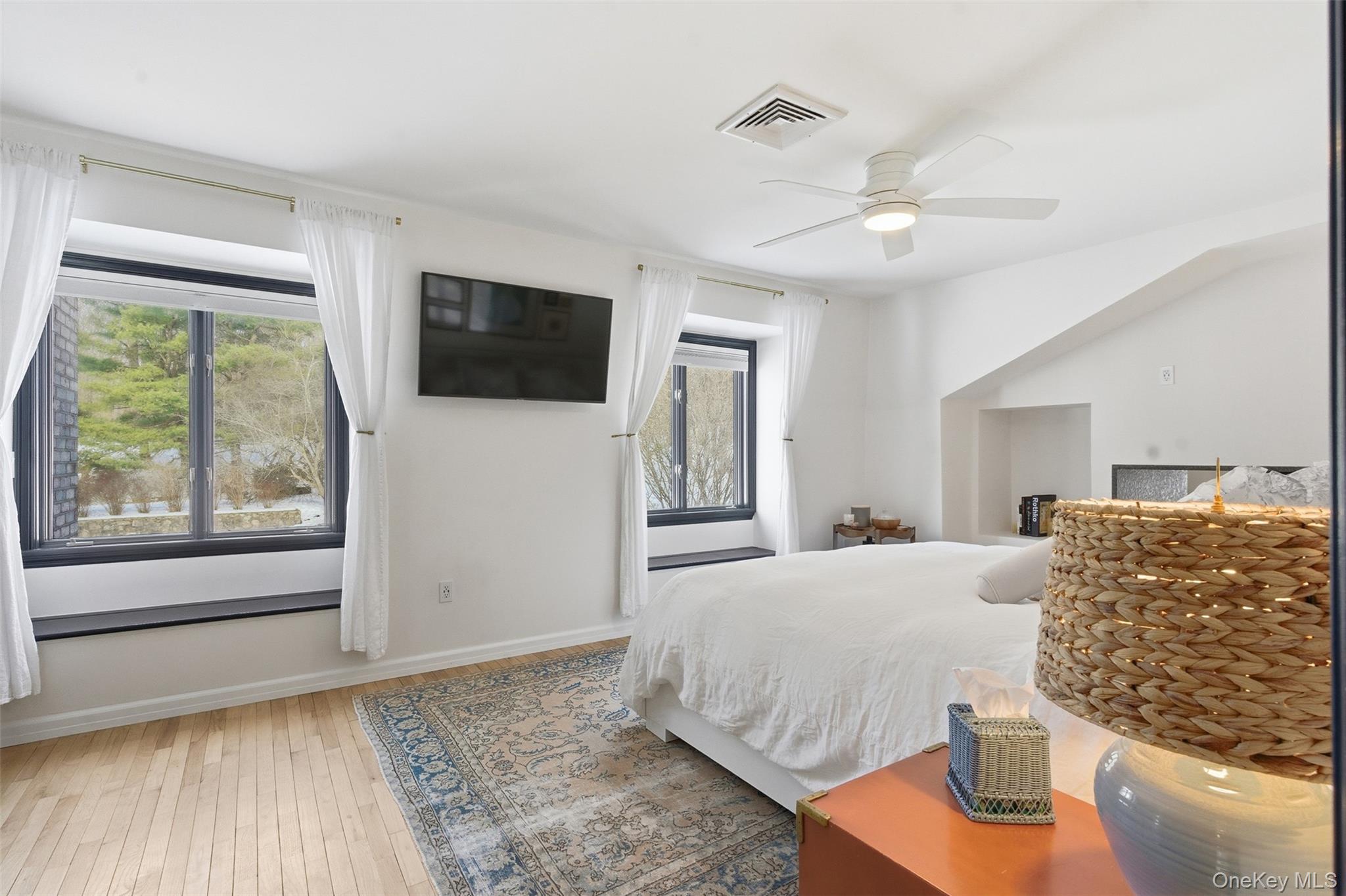 134 Fostertown Road Newburgh, NY 12550 - Photo 26 of 50 a bedroom with a large bed and a flat screen tv